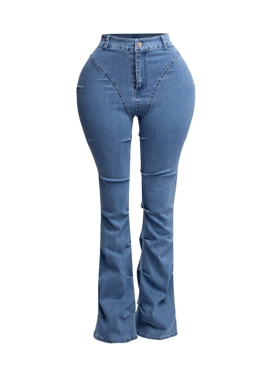 a woman in high rise jeans with a white background