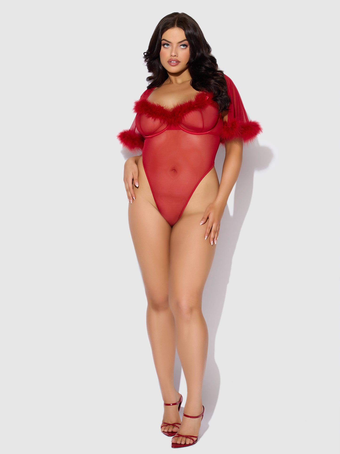 a woman in a red bodysuit with a fur collar