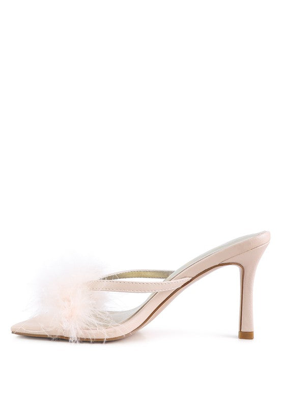 a women's shoe with a feather on the heel