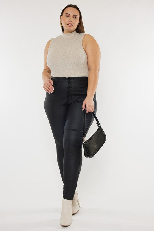 a woman in black pants and a white top