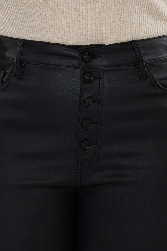 a close up of a person wearing black pants