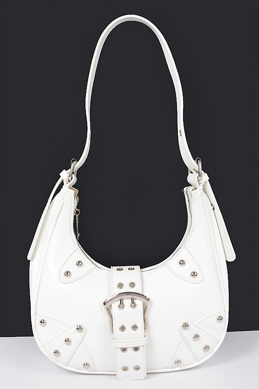 a white purse with a buckle on it