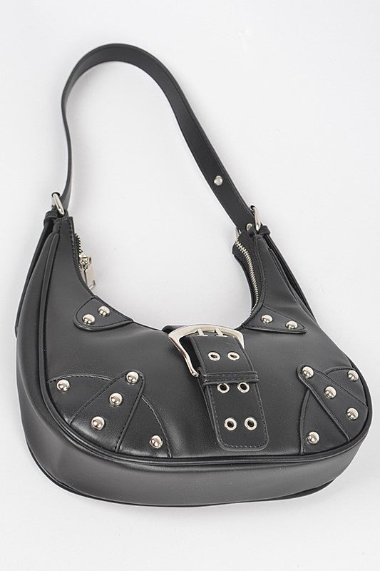 a black purse with silver rivets on the side