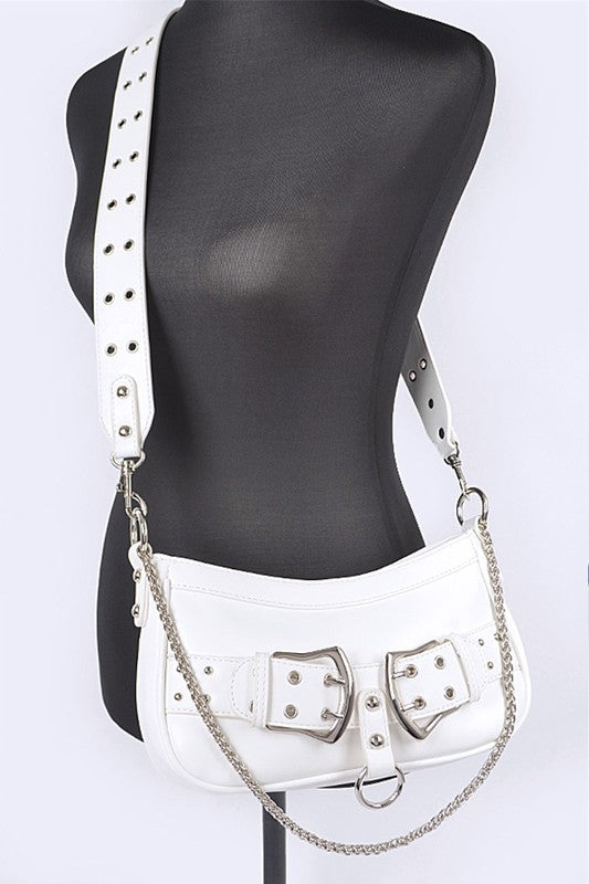 a mannequin wearing a white leather purse