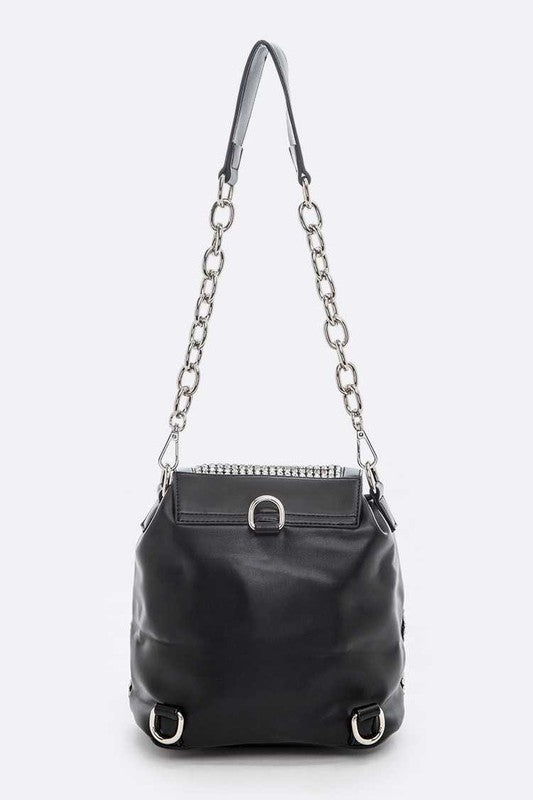 a black handbag with a chain strap