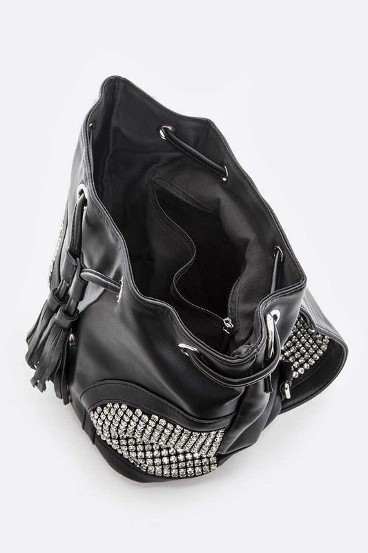 a black handbag with silver studded details