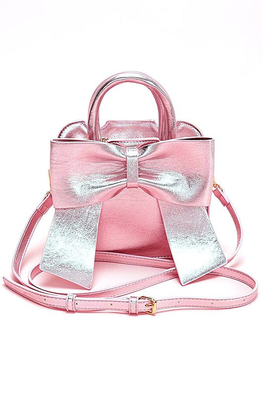 a pink handbag with a bow on it