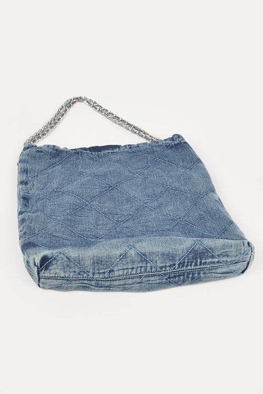 a denim purse with a chain hanging from it