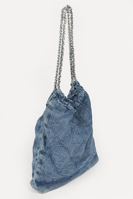 a denim bag with a chain hanging from it