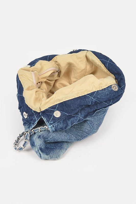 a denim purse with a chain hanging from it