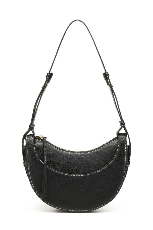 a black purse with a tasselled handle