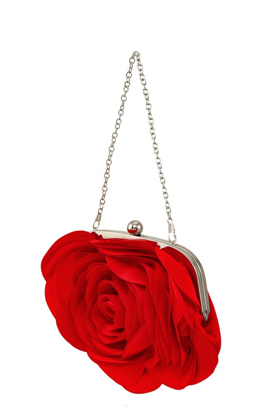 a red rose shaped purse hanging from a chain