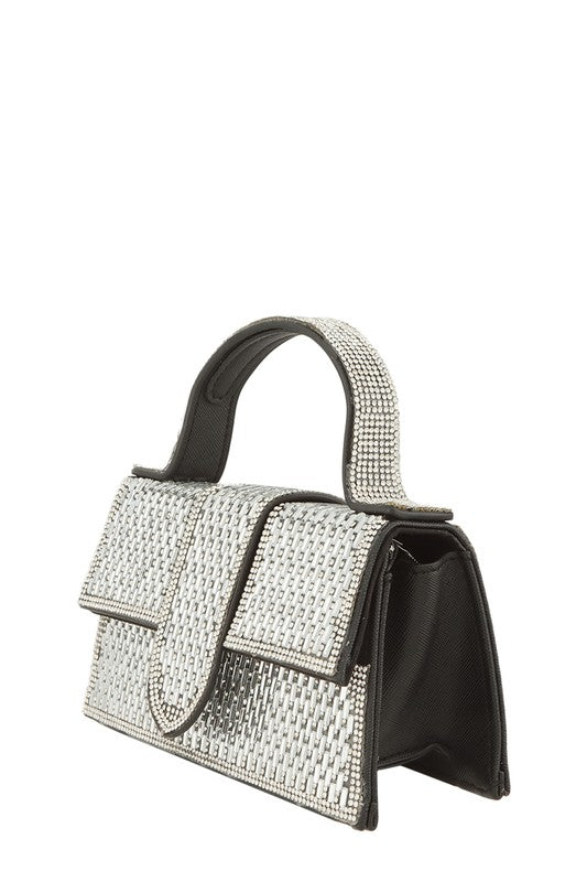 a white and black handbag on a white background