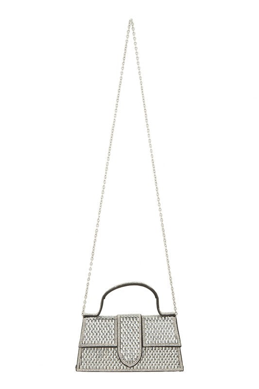 a white purse hanging from a chain