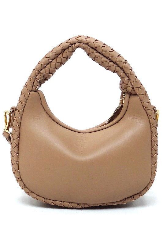 a beige handbag with a braided handle