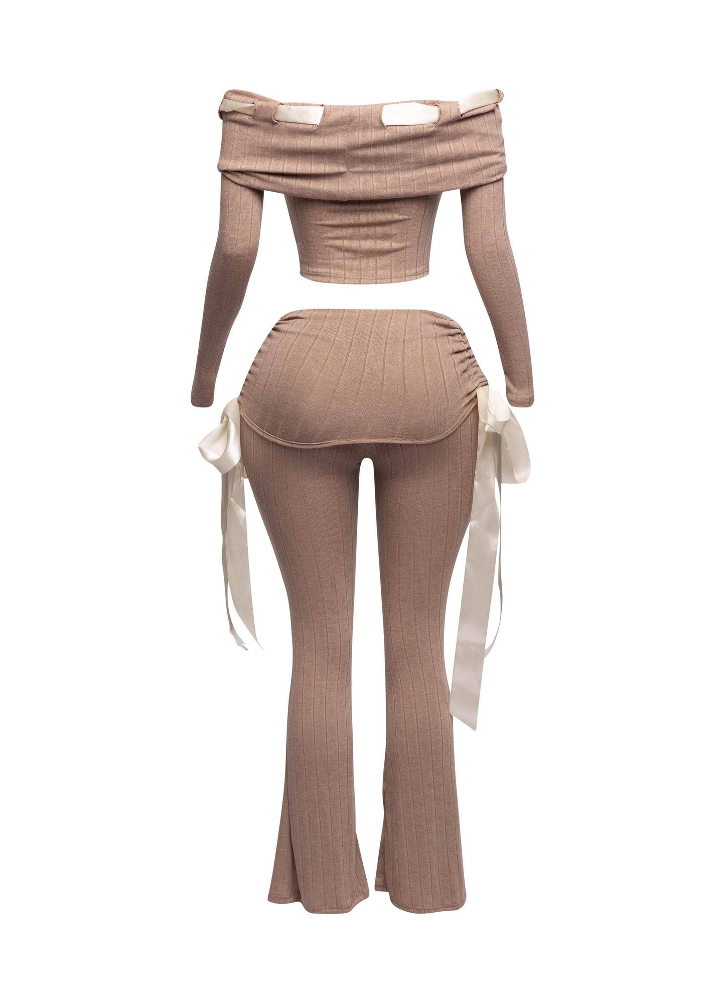 a mannequin wearing a tan outfit with a white bow tie