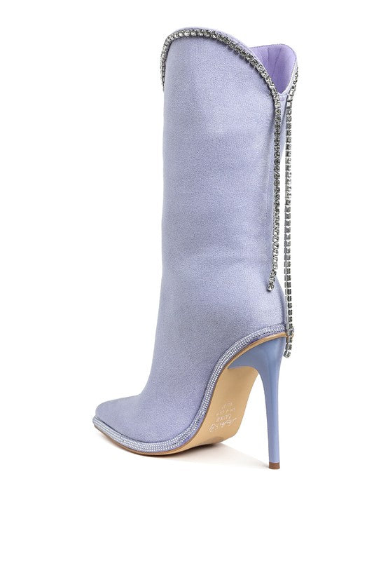 a pair of blue high heel boots with a chain on the side