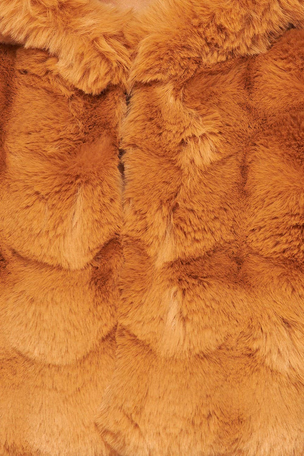 a close up of a fur coat on a mannequin