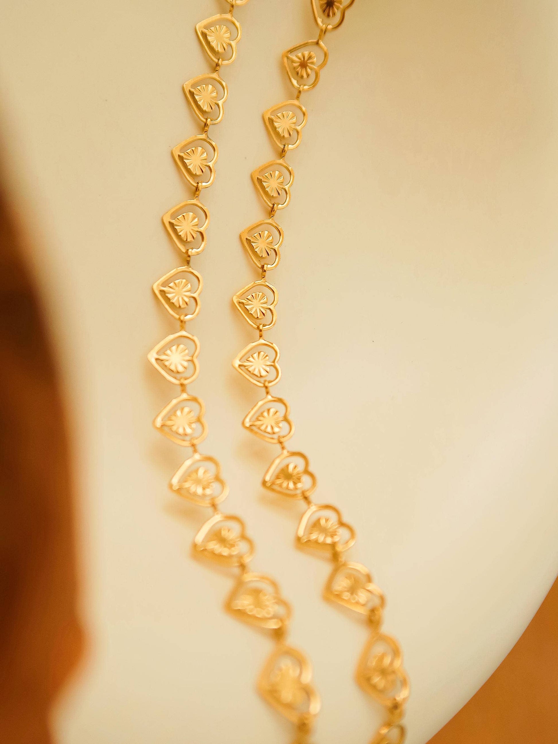 a close up of a necklace on a mannequin