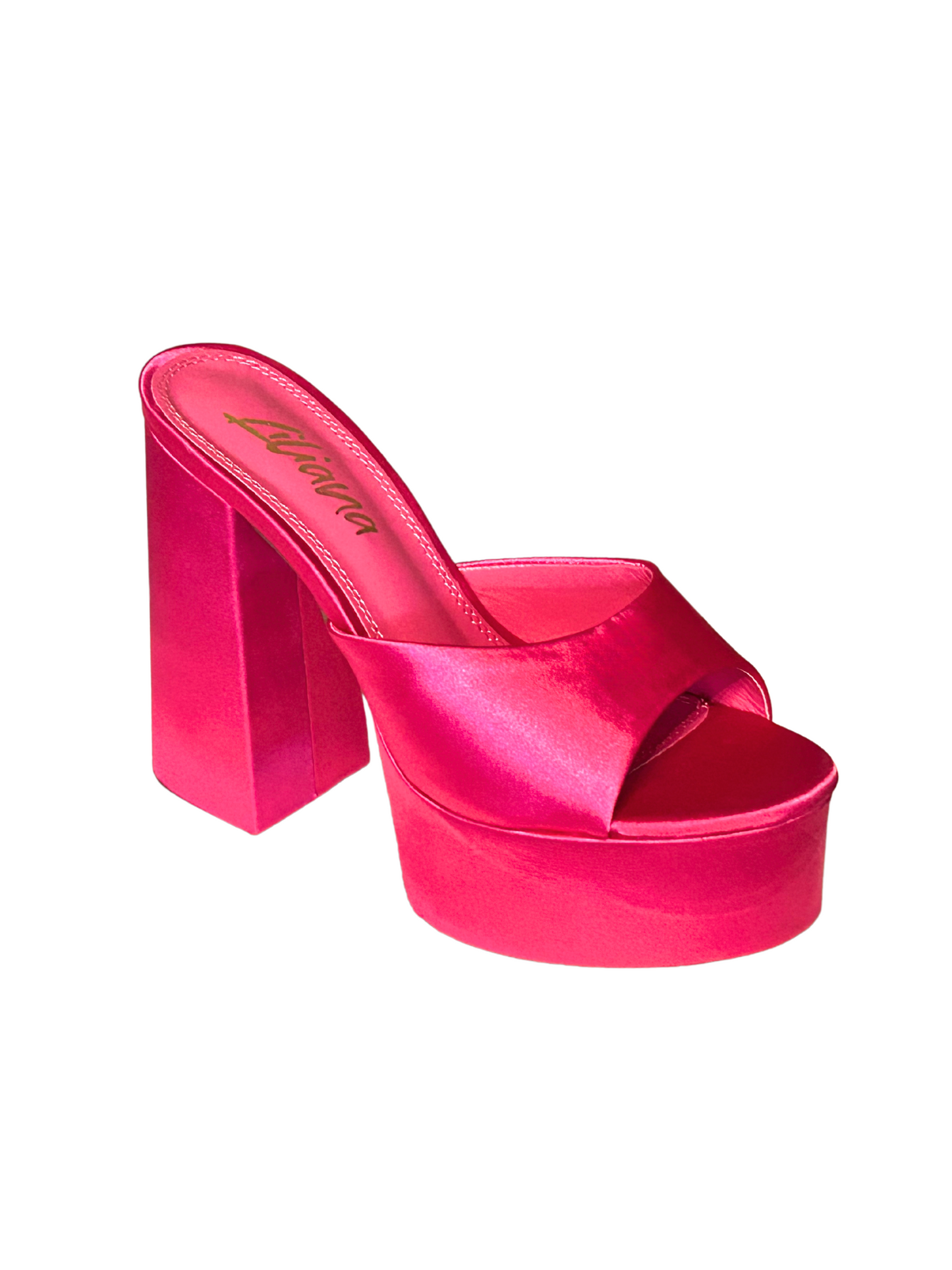 a pink high heeled shoe with a platform