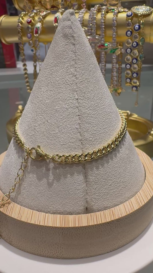 Pulsera de eslabones chapada en oro de 18 quilates con corazón rosa